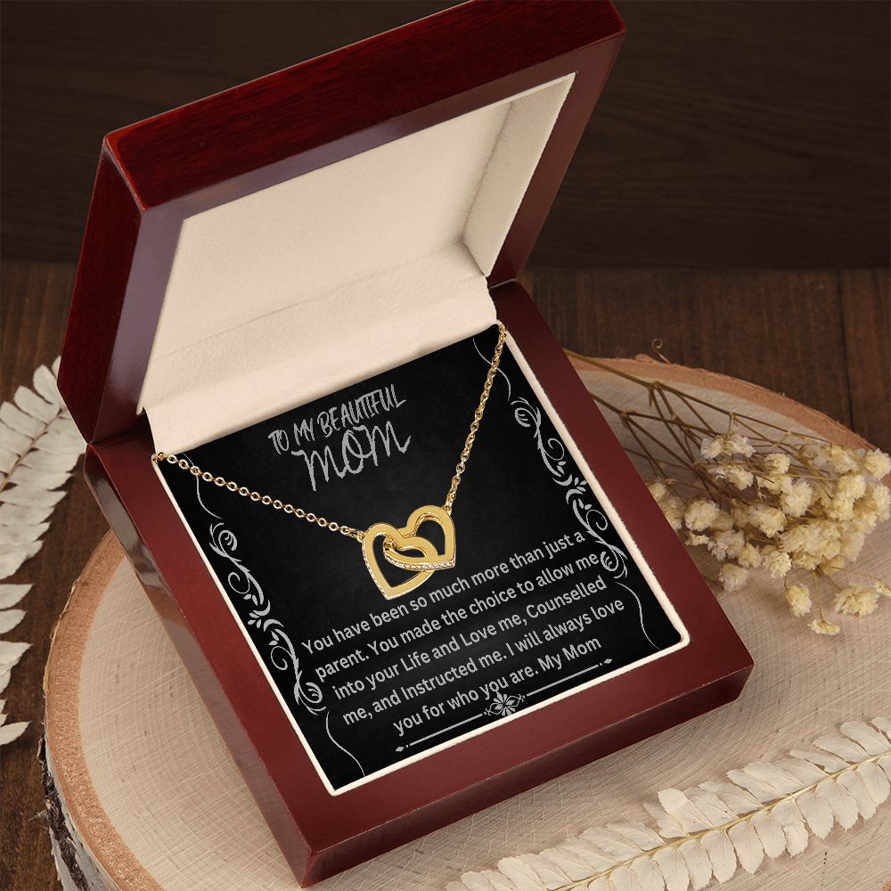 INTERLOCKING HEART NECKLACE